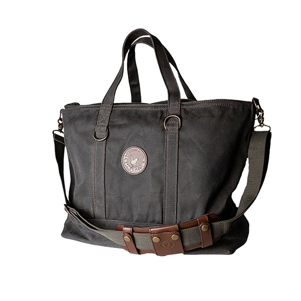 This is a（n） Base Field Tote Tall Coach Field Tote Bag In Signature Coated Canvas With Big